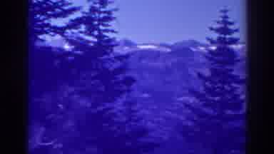 Lake Tahoe California (1938): View Of Snow Covered Mountains Trees On A Cloudy