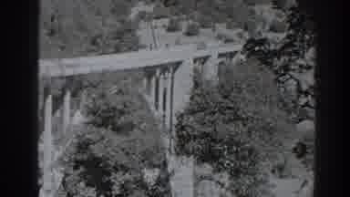 Oroville California (1938): Car Driving Across Bridge