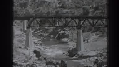 Oroville California (1938): A Black Bridge Surrounded By Nature Of Hills And