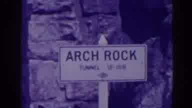 Oroville California (1938): View Of White Arch Rock Sign And Stream On A Bright