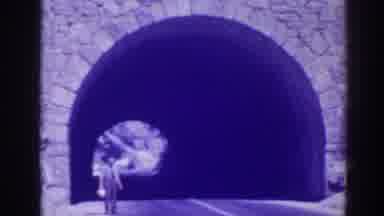 Oroville California (1938): Man Standing Near A Tunnel Two Cars Passing By Each