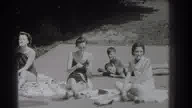 Southhampton New York (1937): Three Women Smoking With Two Children Sunbathing In