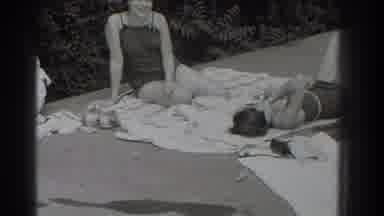 Southhampton New York (1937): Two Women In Bathing Suits Sunbathing One Laughs