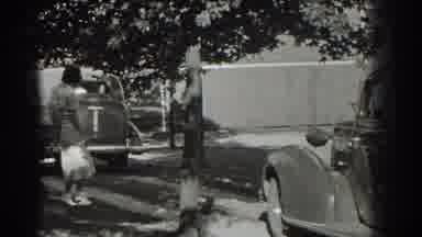 Southhampton New York (1937): Car Pulls Out Of Driveway As Woman Walks Towards