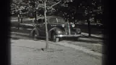 Southhampton New York (1937): A Car Full Of People Are Just Pulling Up The