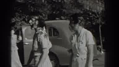 Southhampton New York (1937): Two Sisters Having Fun Beside A Tree As A Man Walked