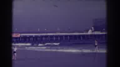 Atlantic City New Jersey (1938): Two People Looking At The Big Blue Waves Coming