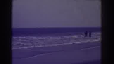 Atlantic City New Jersey (1938): People Walk Along Beach Near Pier As The Tide