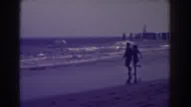 Atlantic City New Jersey (1938): Couple Running On Beach Past Waves On A Clear Day