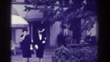 Atlantic City New Jersey (1938): Women Dressed In Black Walk To Grass Where A Man
