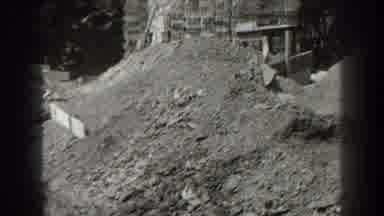 Cumberland Maryland (1938): Pile Of Dirt Near To An Old Black Car Camera Moving To