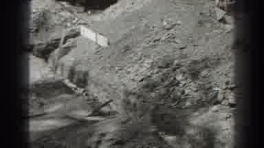 Cumberland Maryland (1938): People Overlooking Mounds Of Dirt In Front Of Old Car