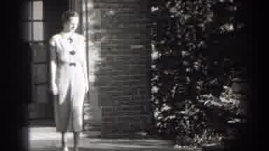 Cumberland Maryland (1938): Lovely Lady Walking Down The Steps Looking At Her