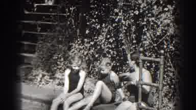 Cumberland Maryland (1938): Woman Wearing Black Swimwear Puts On Grey Swim cap
