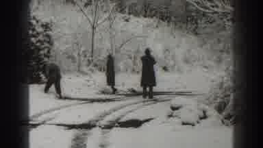 Martinsburg West Virginia (1938): Three People Standing On Snow Covered Road On A