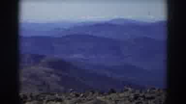 Mount Washington New Hampshire (1938): Person Wearing Green Hat Walks To