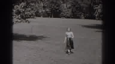New Jersey (1938): A Couple Walking In A Park Having Fun With Their Mascot