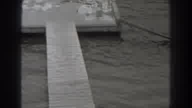 New Jersey (1938): Woman In A Black Bathing Suite Sitting And Drying Up On A Deck