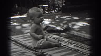 New Jersey (1938): A Child While Plays On A Carpet The Parents Shoot The Video