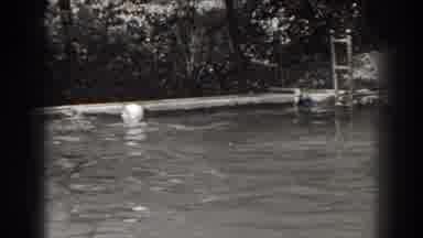 New Jersey (1938): Woman Enjoying A Nice Swim In A Pool Before Stepping Out
