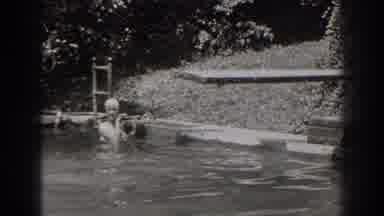 New Jersey (1938): Person Swimming Water Diving Board Outside Pool