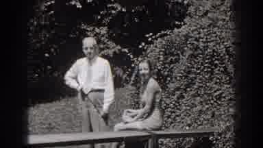 New Jersey (1938): A Man And A Woman Standing Outside Near A Bush Wit The Woman