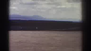 Quebec (1938): Building With Vents On Roof Near Empty Dirt Field Surrounded By