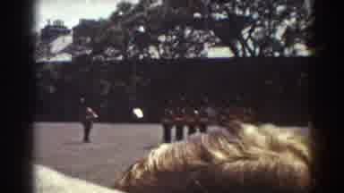 Quebec (1938): Men Are In Their Uniform Standing In Formation Before A Audience