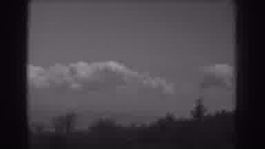West Virginia (1938): Fair Weather Cumulus In Sky Cutting To Cars On A Curvy Road