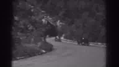 West Virginia (1938): Car Drives Into A Tunnel That Goes Under A Mountain Covered