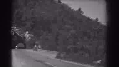 West Virginia (1938): Car Exits From Tree Covered Tunnel On A Clear Day