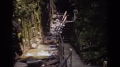 Mount Washington New Hampshire (1939): Woman Wearing White Dress Walks Concrete