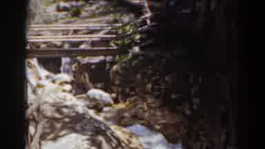 Mount Washington New Hampshire (1939): Woman Wearing Tan Dress Crosses Wooden