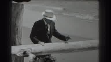 San Francisco California (1939): Man Spends Time With His Dog At The Beach