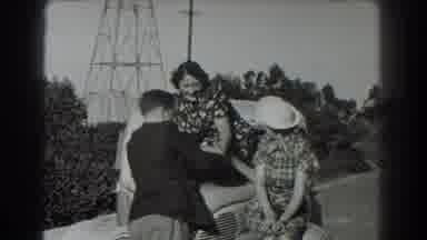 San Francisco California (1939): Two Women And A Man Playing On Top Of A Car In