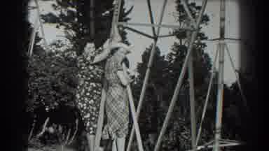San Francisco California (1939): Woman Climb Pylon For Photo Shoot Black And White