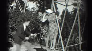 San Francisco California (1939): Man Pointing Toy Gun At Two Women
