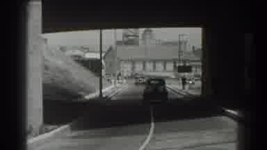 San Francisco California (1939): Car Changing Lanes Underneath A Bridge With An