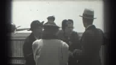 San Francisco California (1939): People In Airbase Talking Pointing To Something