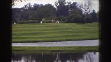 Florida (1941): Panning Wide Shot Of A Well-Manicured Green Patch Of Grass