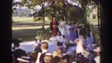Florida (1941): Outdoor Wedding Flower Crown Many People Vows Suites In A Park
