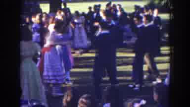 Who knew the space for dancing was in vintage suits in a park?