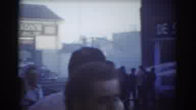 York Nebraska (1958): Firefighters Spraying Water Into A Building While A Crowd