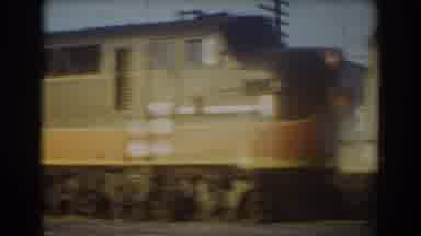York Nebraska (1958): Steel Train Passing Through York Nebraska In Front Of A