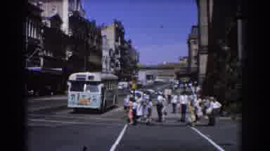 Brisbane Australia (1967): View Of Light Blue Bus And City Traffic On A Sunny Day