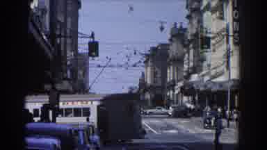 Brisbane Australia (1967): San Francisco Trolley Cars Move Around In Traffic In