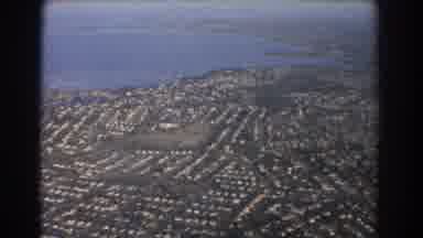 Brisbane Australia (1967): Fly By Of Coastal Town From Above