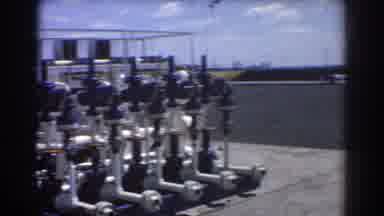 Brisbane Australia (1967): Three Men Talking While Standing On White Platform On A