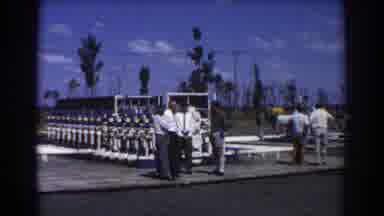 Brisbane Australia (1967): Several People Gathered At A Water Treatment Plant