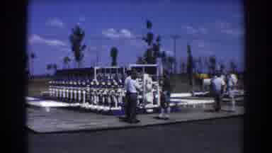 Brisbane Australia (1967): Several Men In An Open Environment Talking About A